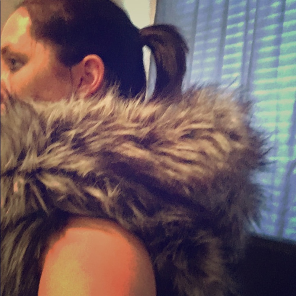 Faux fur vest with oversized hood